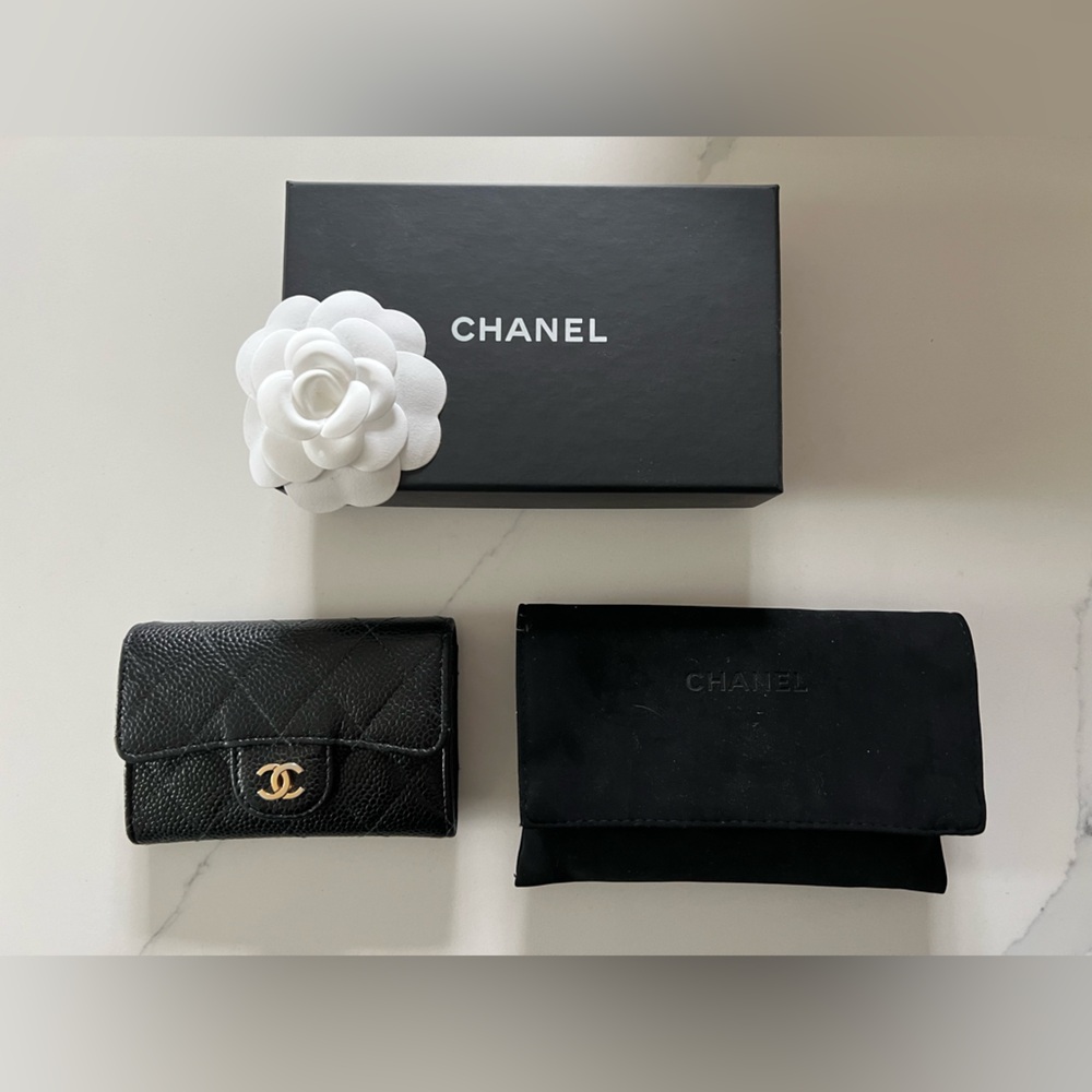 Chanel black quilted card holder/wallet. 4.5” w, 3” t, expands 2”